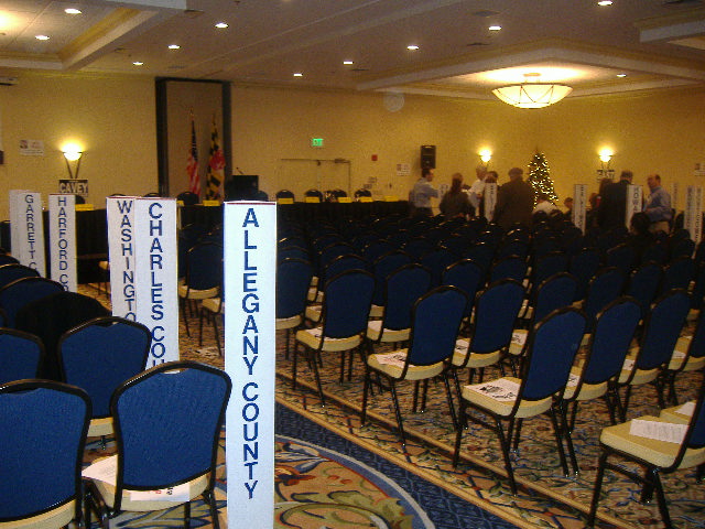 The convention hall awaits the transaction of our business.